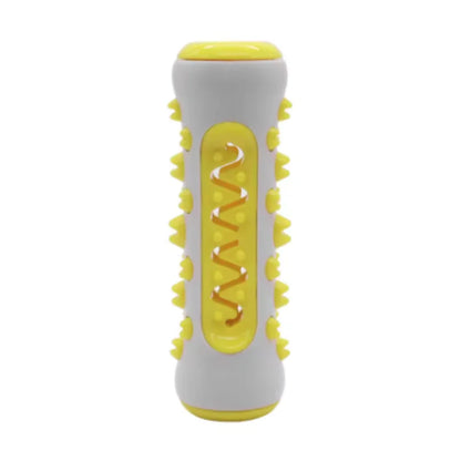 Yellow textured toothbrush chew toy standing upright on a white background