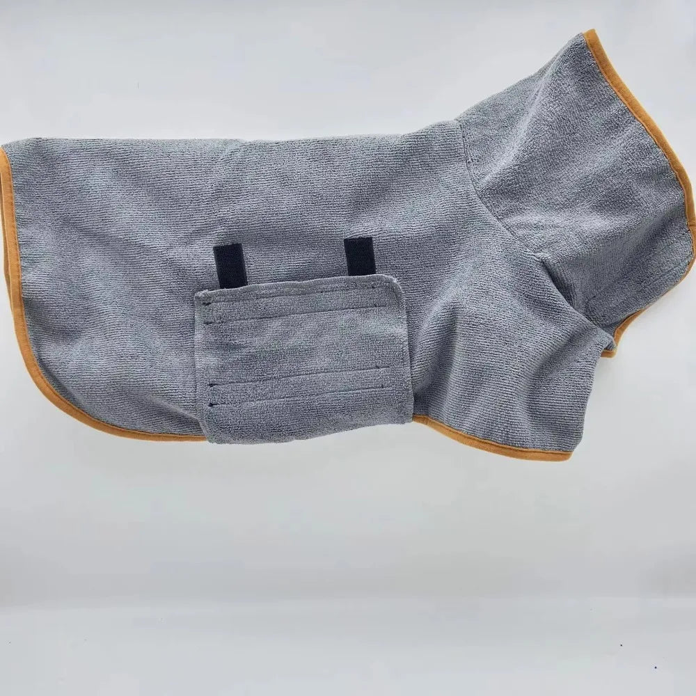 Gray dog bathrobe with orange trim laid flat, showing the high collar and chest panel